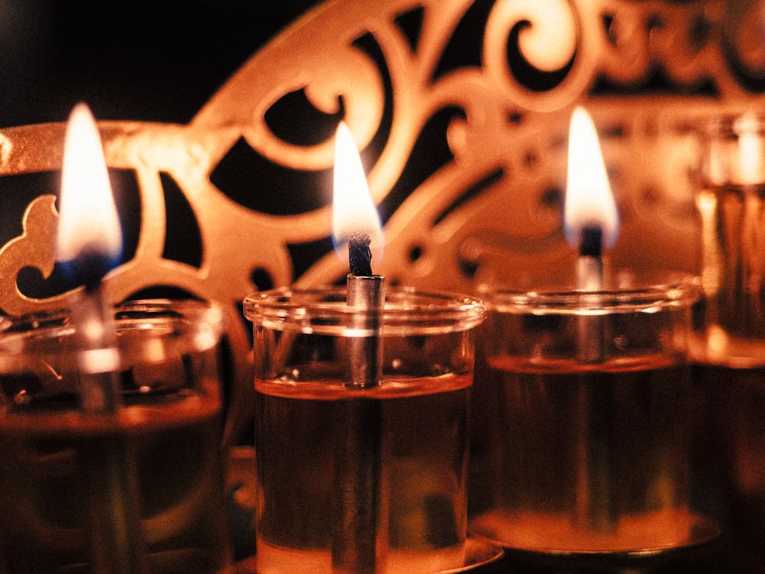 A group of candles sitting on top of a table